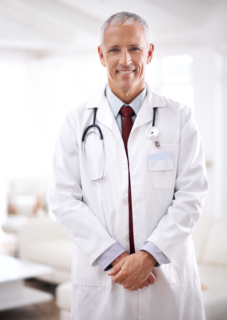 healthcare-portrait-doctor-with-smile-hospital-support-services-wellness-medicine-happy-face-mature-medical-professional-confidence-help-treatment-clinic-728x1024